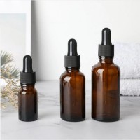 Hot Sell Good Quality 5ml-100ml Transparent/Blue/Amber glass Cosmetic Bottles for essential oil